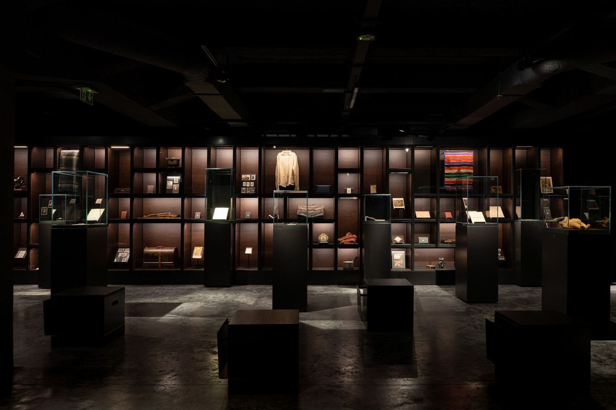 Illuminated historical displays inside the Sybir Memorial Museum.